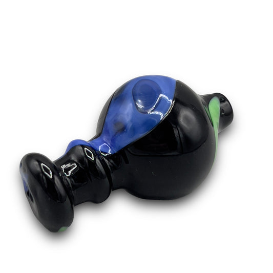 this is a black carb cab with all black glass. It has blue an dgreen swirl color mixed in.