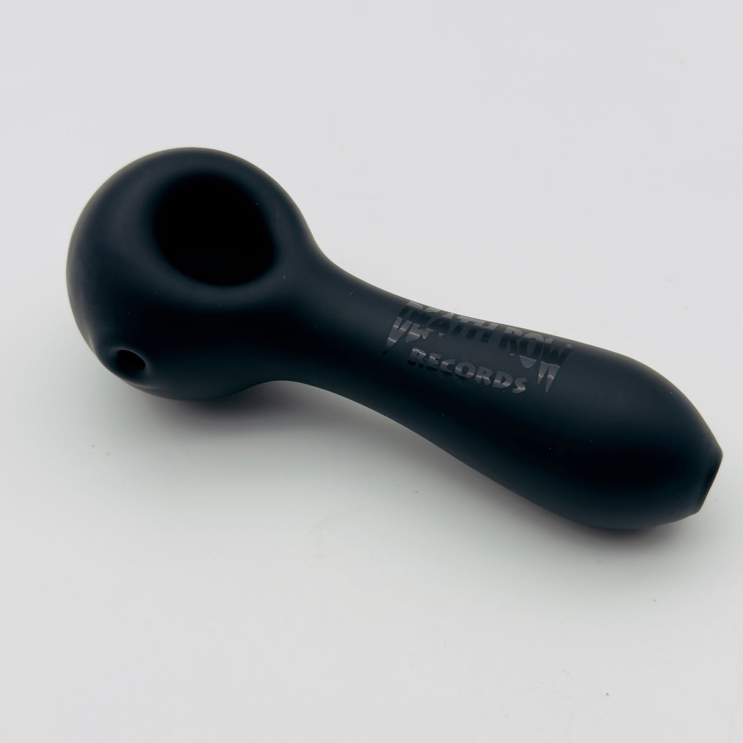 Black glass pipe with 'Grav' branding on a white background