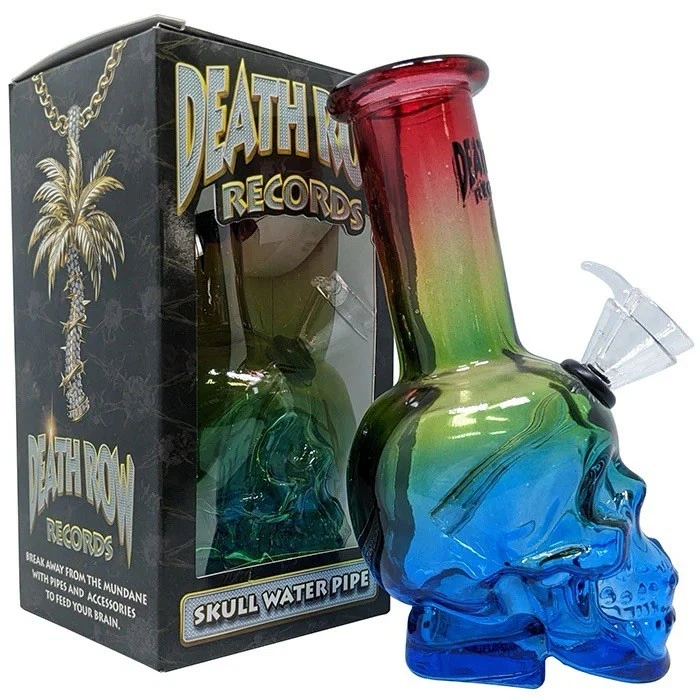 Glass skull water pipe with rainbow gradient next to 'Death Row Records' packaging.
