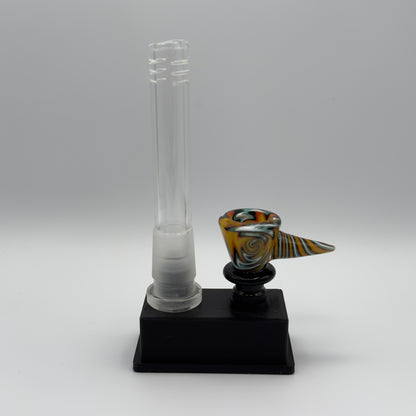 Downstem and bowl displayed on a stand. 